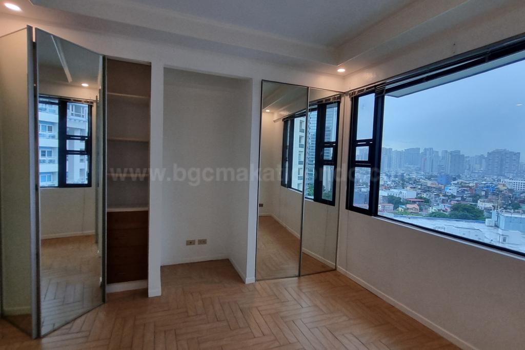 Master's bedroom of 2-bedroom condo unit at Bonifacio Ridge
