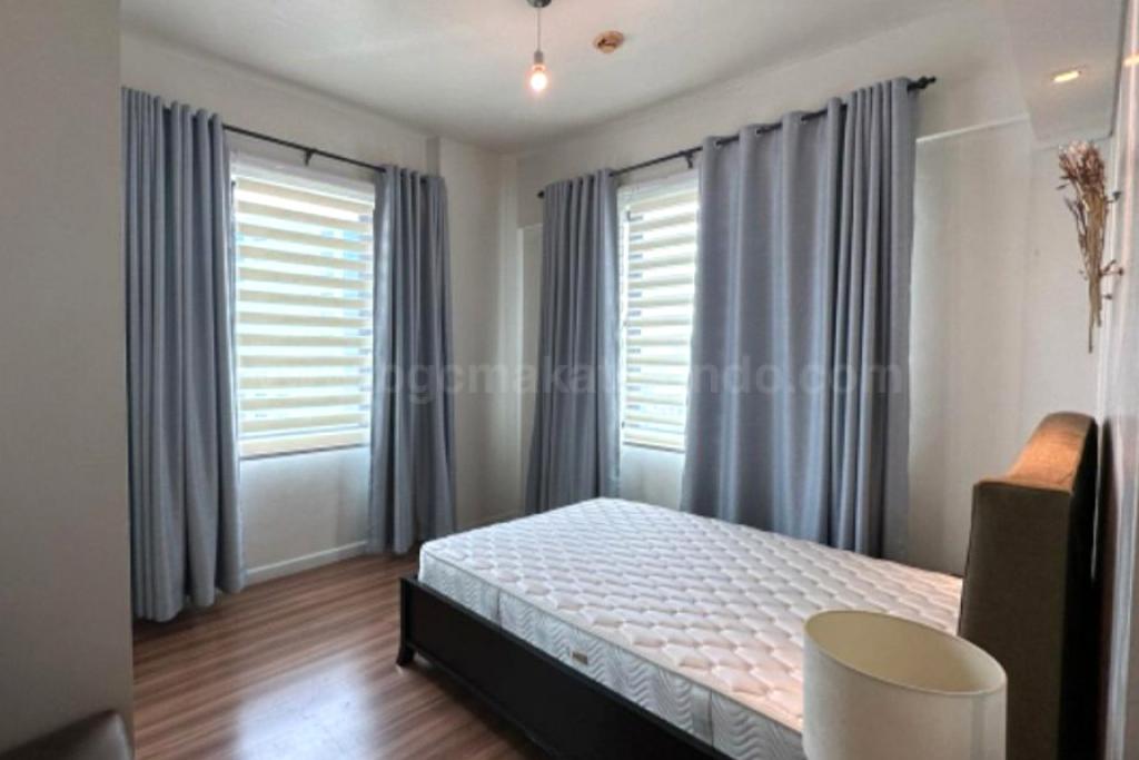 Bedroom 2 of 2-bedroom condo unit at Bonifacio Ridge