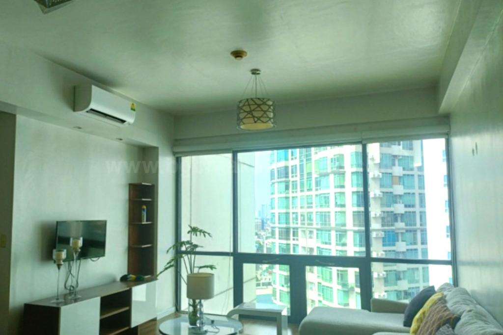Living area of 2-bedroom condo unit at Bonifacio Ridge