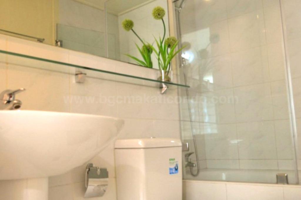 Toilet and bath of 2-bedroom condo unit at Bonifacio Ridge