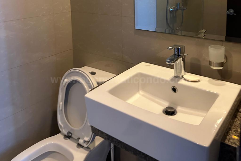 Common toilet and bath of 2-bedroom condo unit at Uptown Ritz Residence