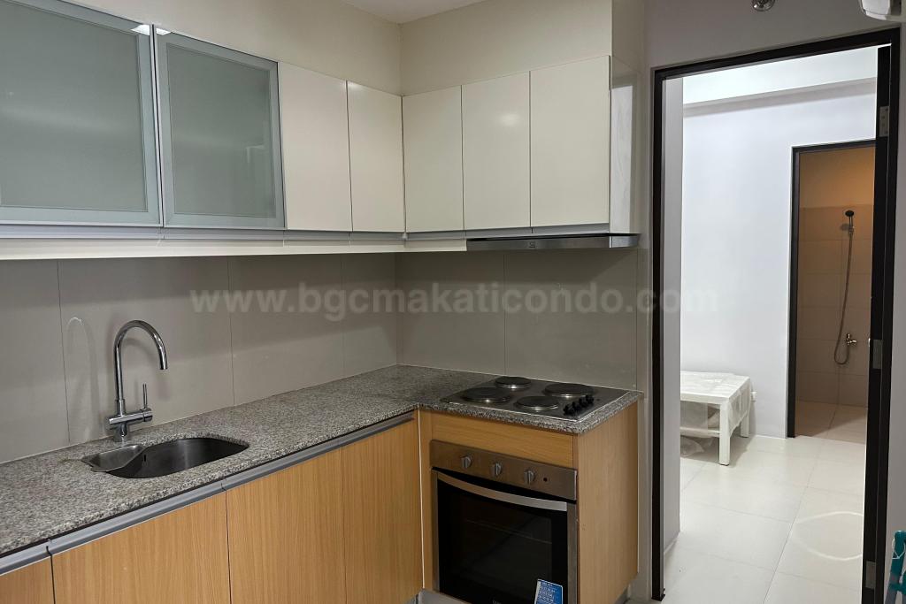 Kitchen area of 2-bedroom condo unit at Uptown Ritz Residence