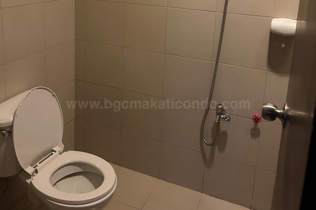 Utility toilet and bath of 2-bedroom condo unit at Uptown Ritz Residence