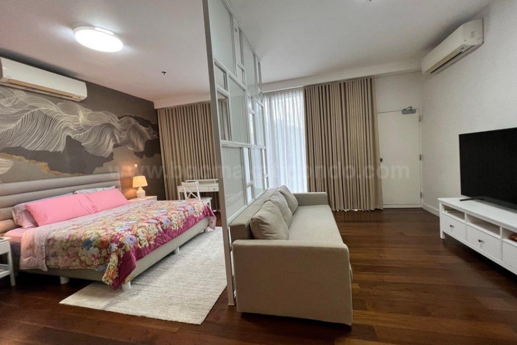 Bedroom of 1-bedroom loft type condo unit at Arbor Lanes Willow