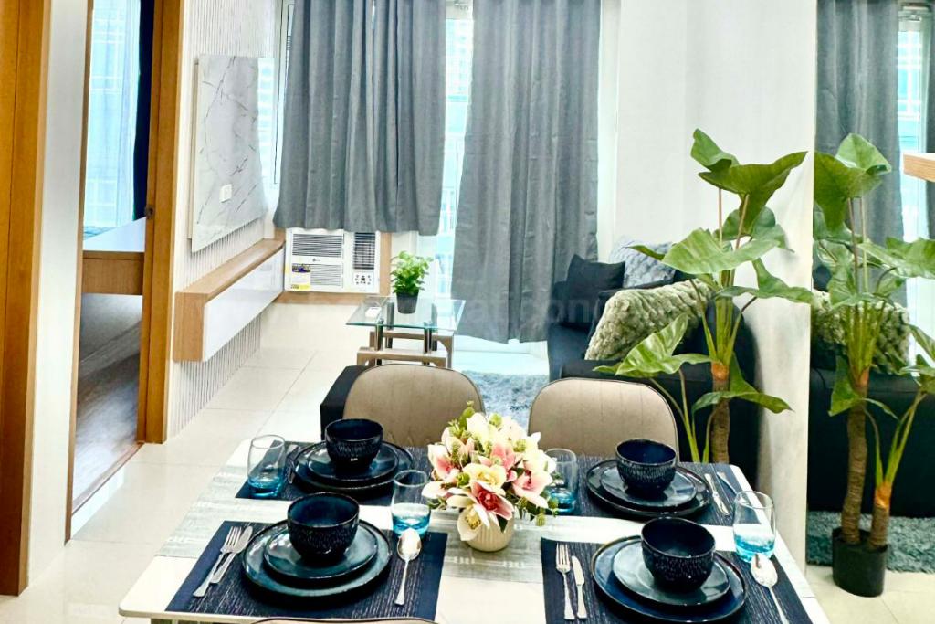 Dining and living areas of 1-bedroom condo unit at Times Square West