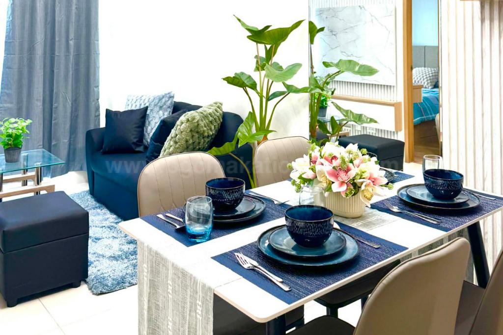 Dining and living areas of 1-bedroom condo unit at Times Square West