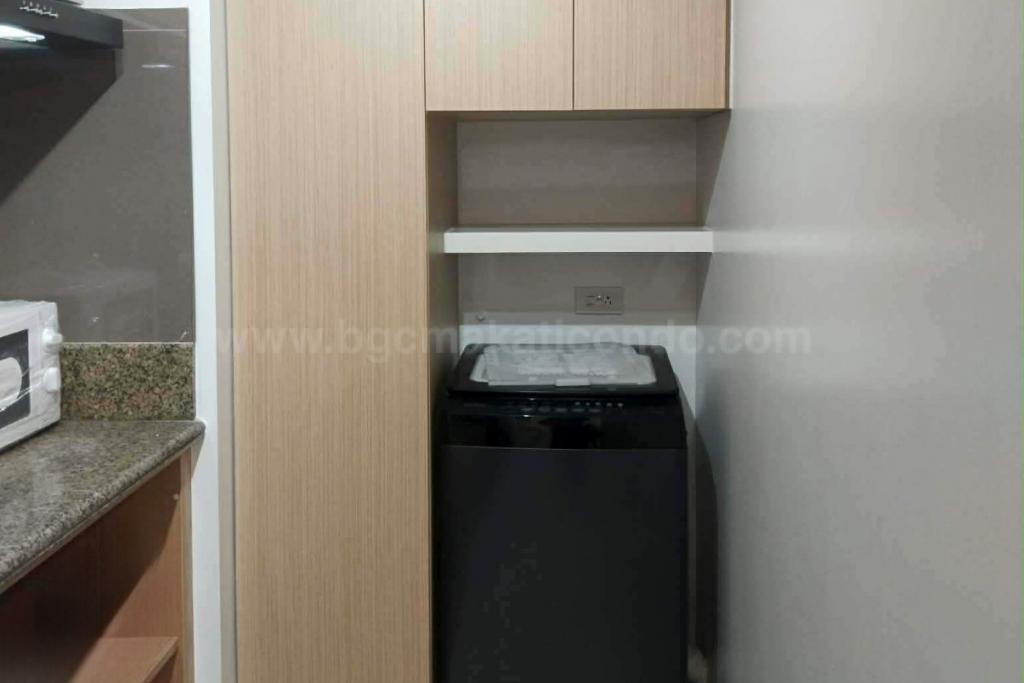 Kitchen area of 1-bedroom condo unit at Times Square West