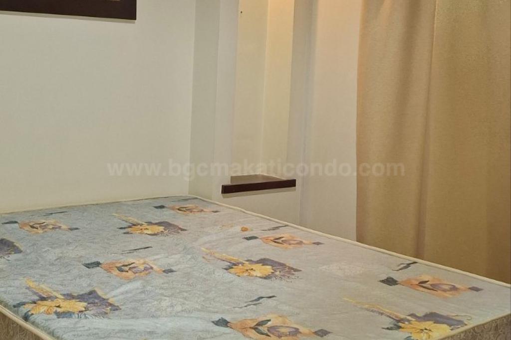 Master's bedroom of 2-bedroom condo unit at Bonifacio Ridge