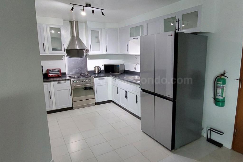 Kitchen area of 2-bedroom condo unit at Bonifacio Ridge