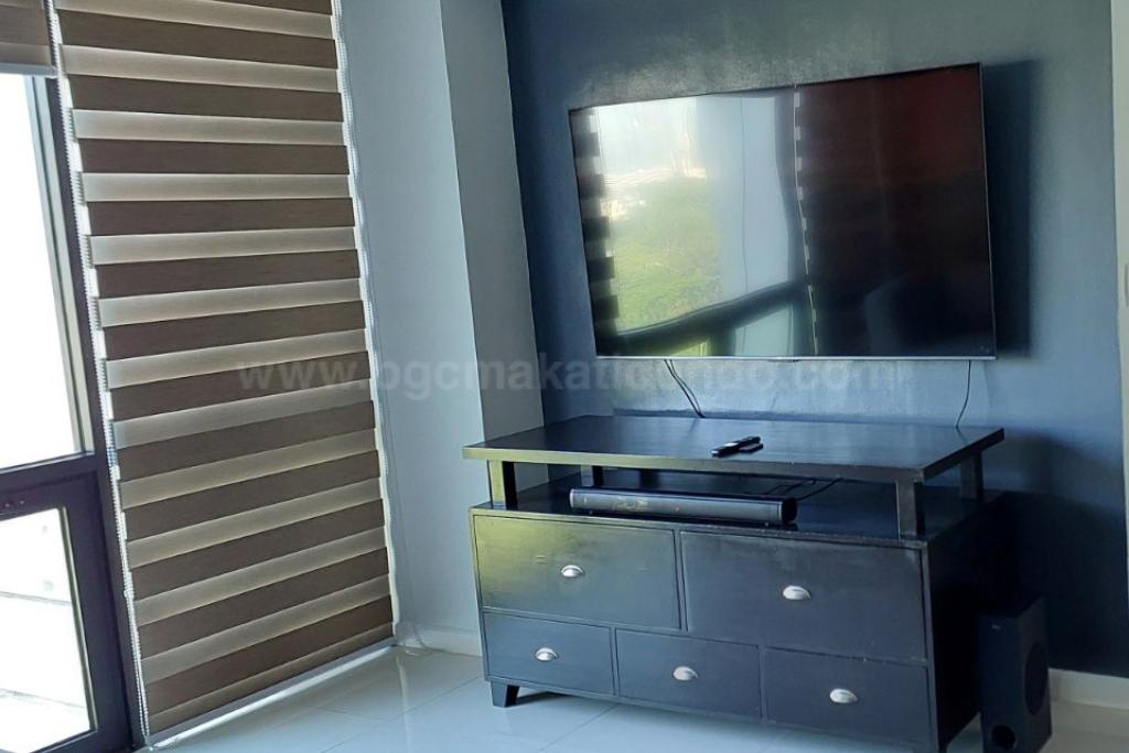 Living area television of 2-bedroom condo unit at Bonifacio Ridge