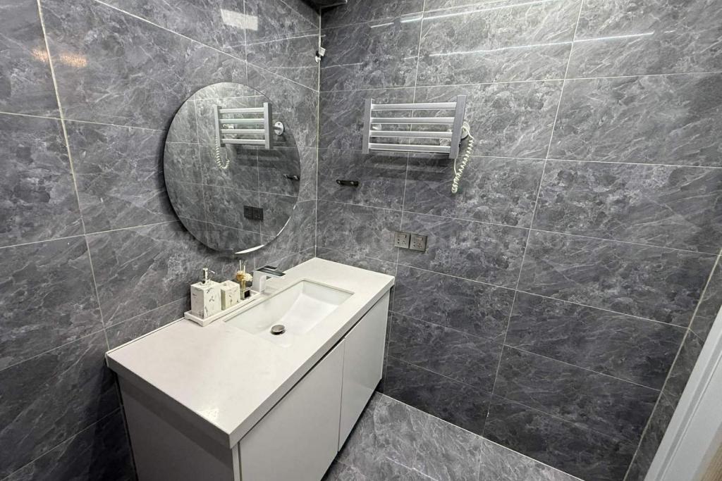 Toilet and bath of 2-bedroom condo unit at The Trion Towers tower 2