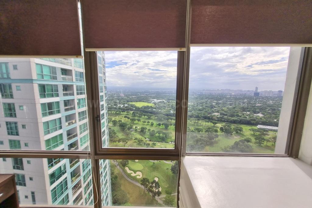 Floor-to-ceiling windows of master's bedroom of 2-bedroom condominium unit at Bellagio Tower 3