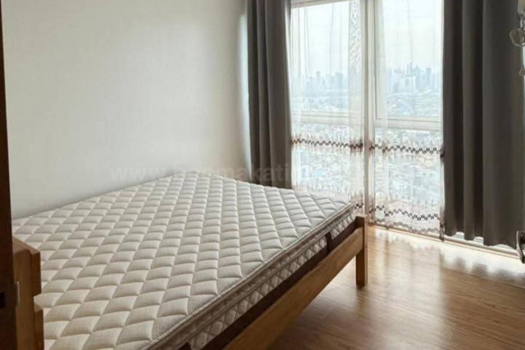 Bedroom of 1-bedroom condo unit at Times Square West