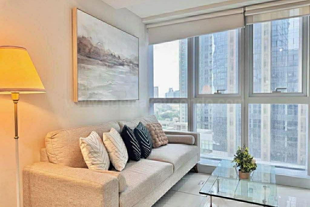 Living area of executive 2-bedroom condo unit at Uptown Parksuites tower 1