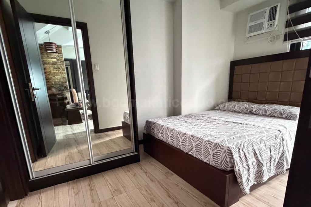 Bedroom 2 of 2-bedroom loft unit at The Fort Residences