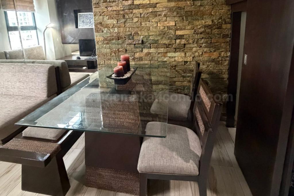 Dining area of 2-bedroom loft unit at The Fort Residences