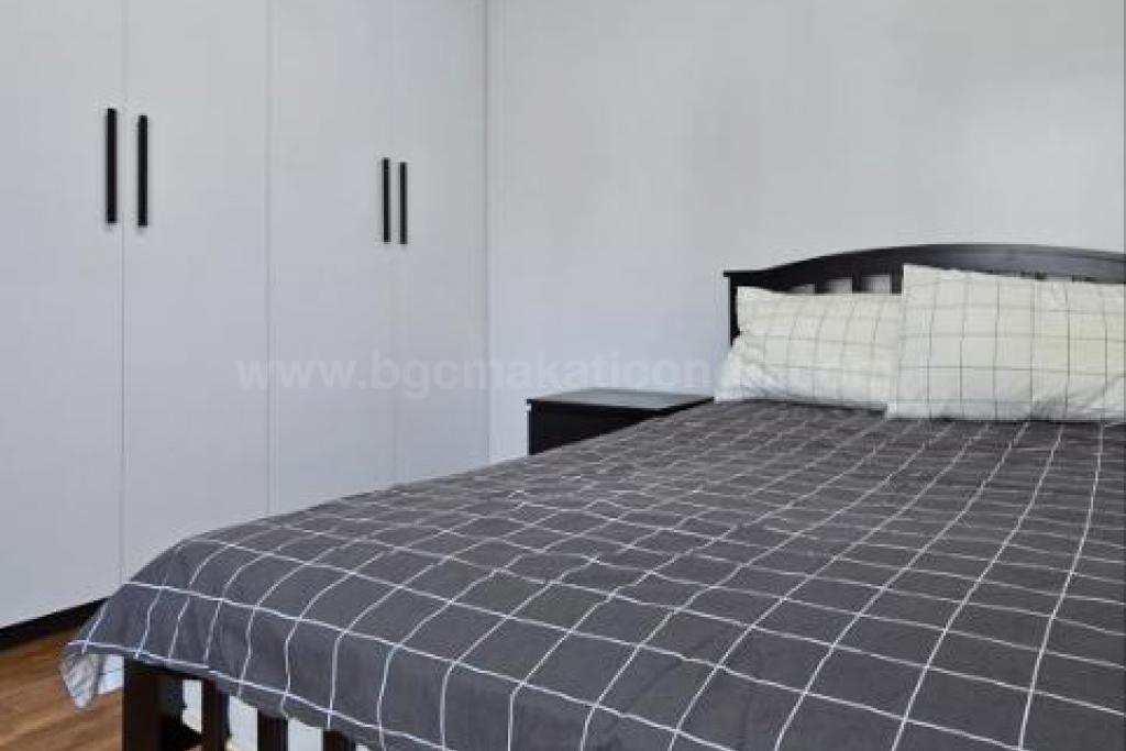 Bedroom 2 of 2-bedroom condo unit at Crescent Park Residences