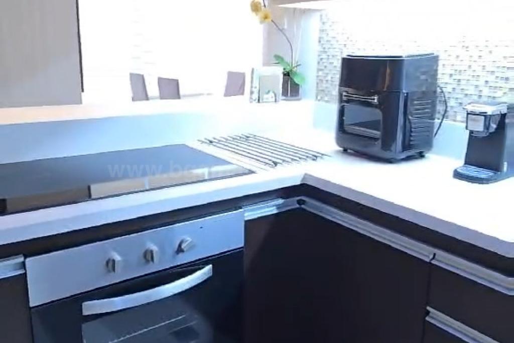 Kitchen area of 2-bedroom condo unit at Crescent Park Residences