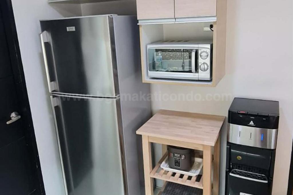 Kitchen area of 2-bedroom condo unit at Crescent Park Residences