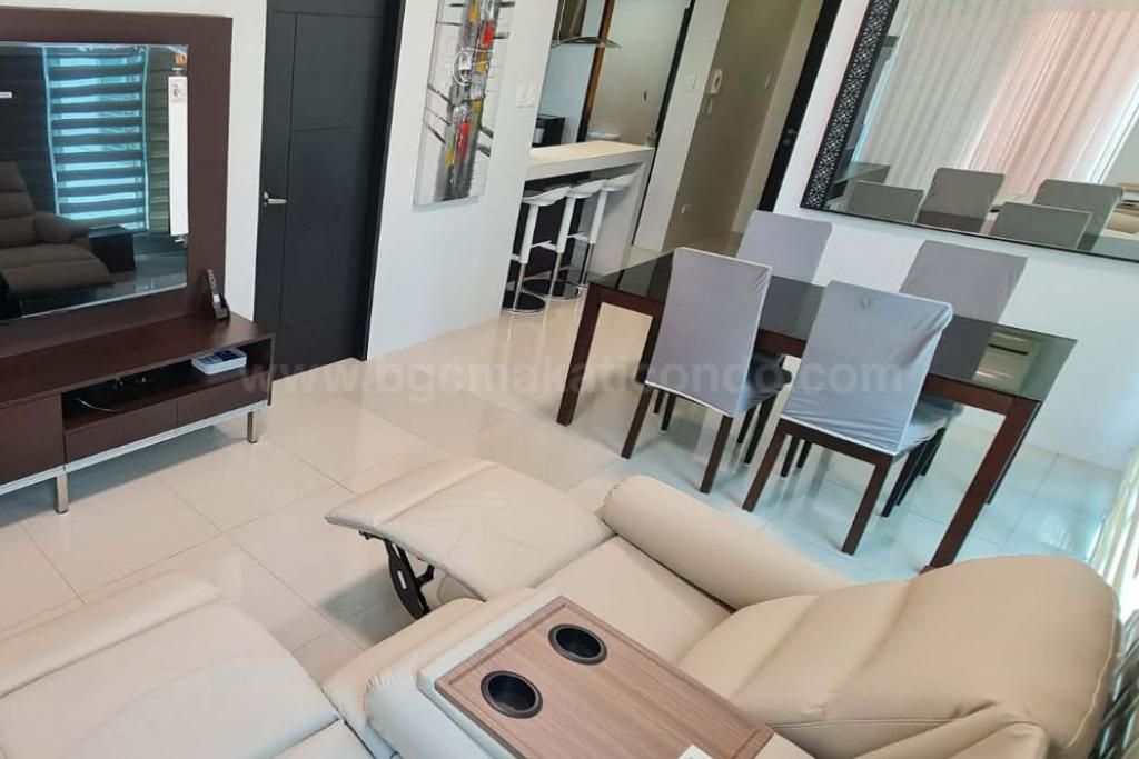 Living and dining areas of 2-bedroom condo unit at Crescent Park Residences