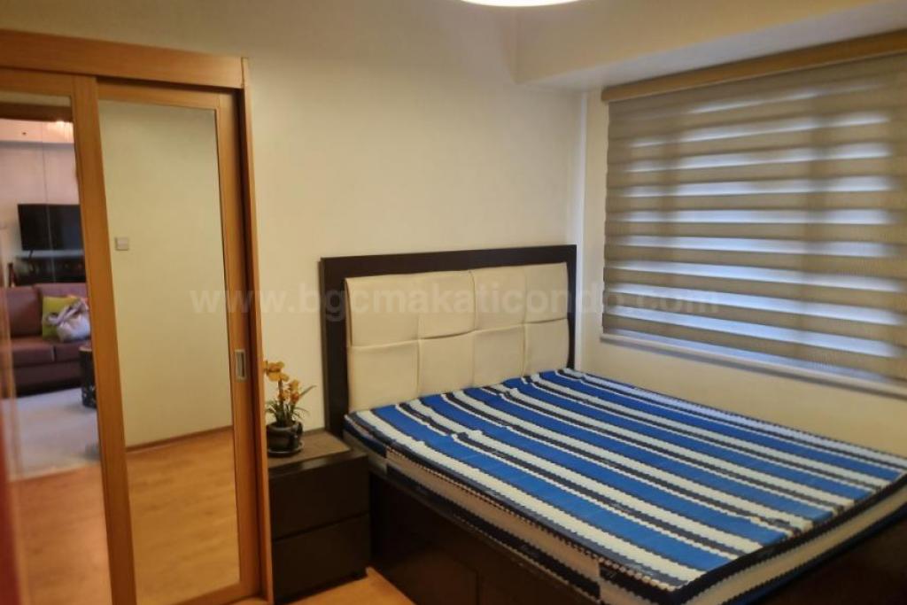 Bedroom of 1-bedroom condo unit at The Trion Towers tower 1