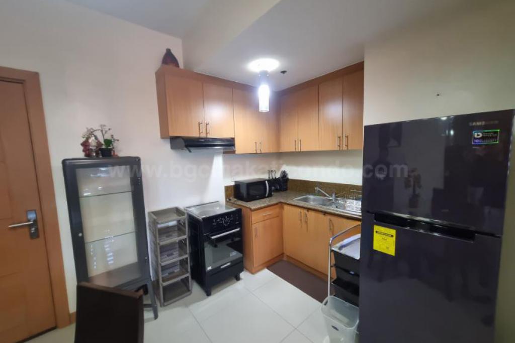 Kitchen area of 1-bedroom condo unit at The Trion Towers tower 1
