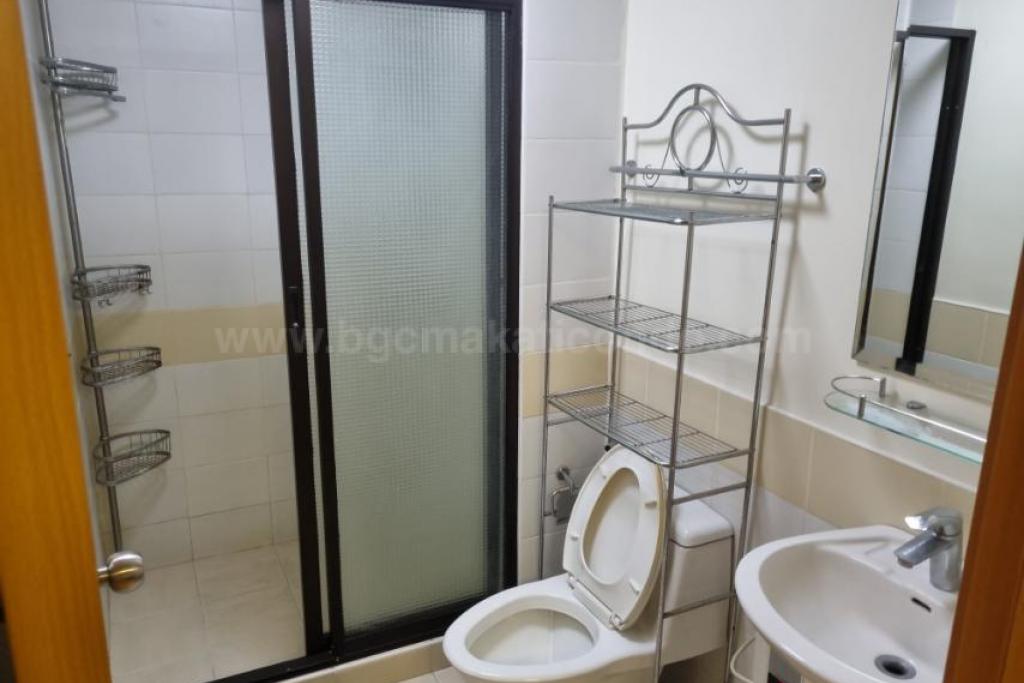 Toilet and bath of 1-bedroom condo unit at The Trion Towers tower 1