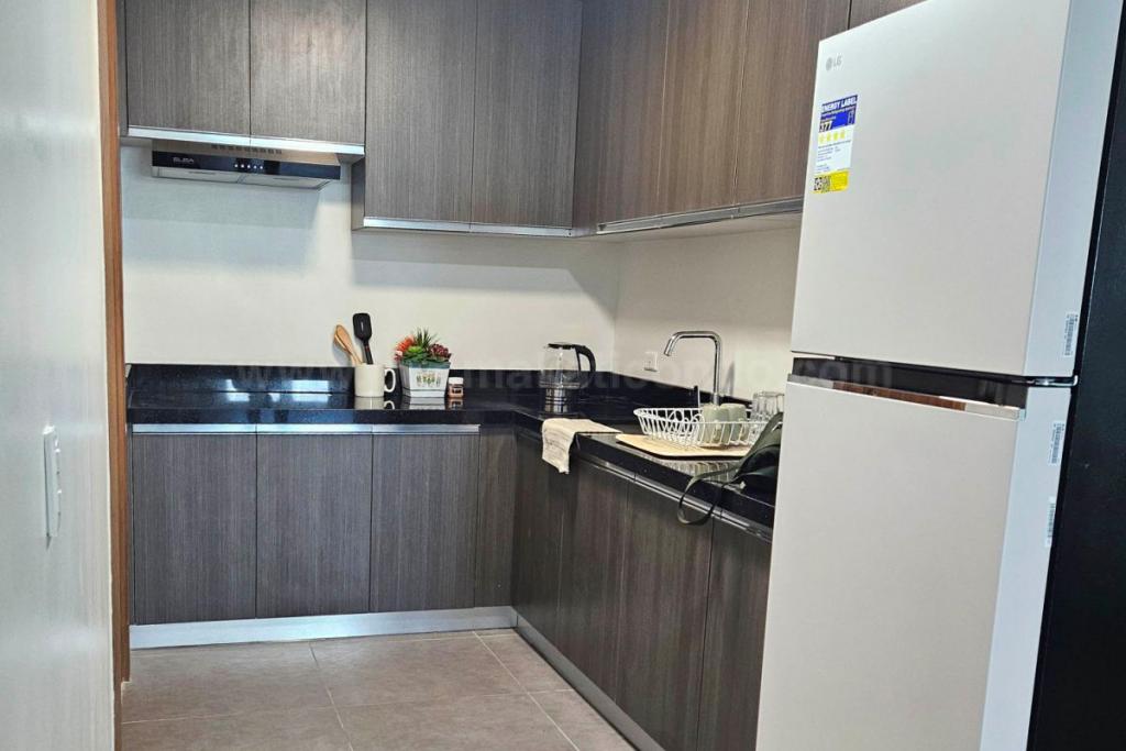 Kitchen area of 2-bedroom condo unit at The Connor at Greenhills