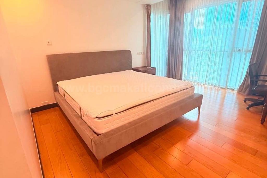 Bedroom 2 of 2-bedroom condo unit at One Serendra West Tower