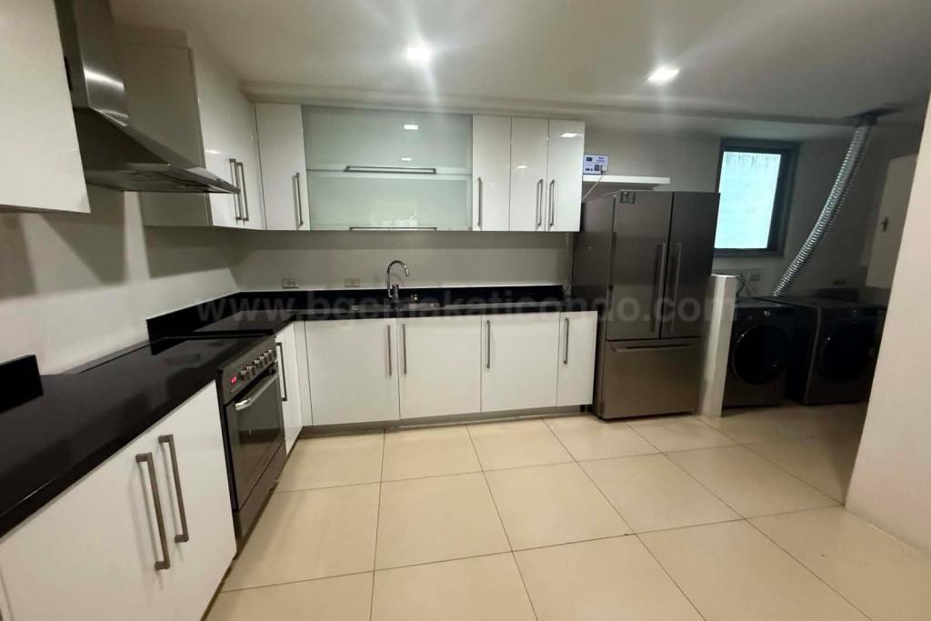 Kitchen area of 2-bedroom condo unit at One Serendra West Tower