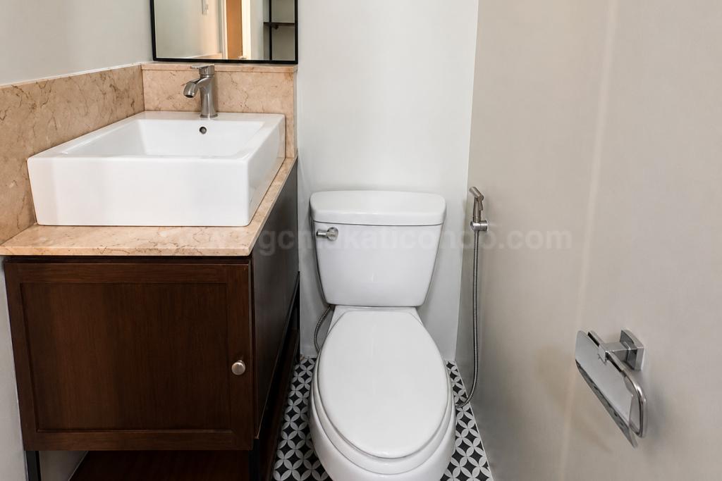 Toilet and bath 1 of 2-bedroom condo unit at The Manansala