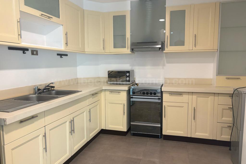 Kitchen area of 2-bedroom condo unit at Bonifacio Ridge