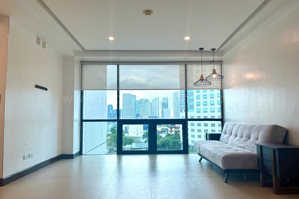 Living area of 2-bedroom condo unit at Bonifacio Ridge