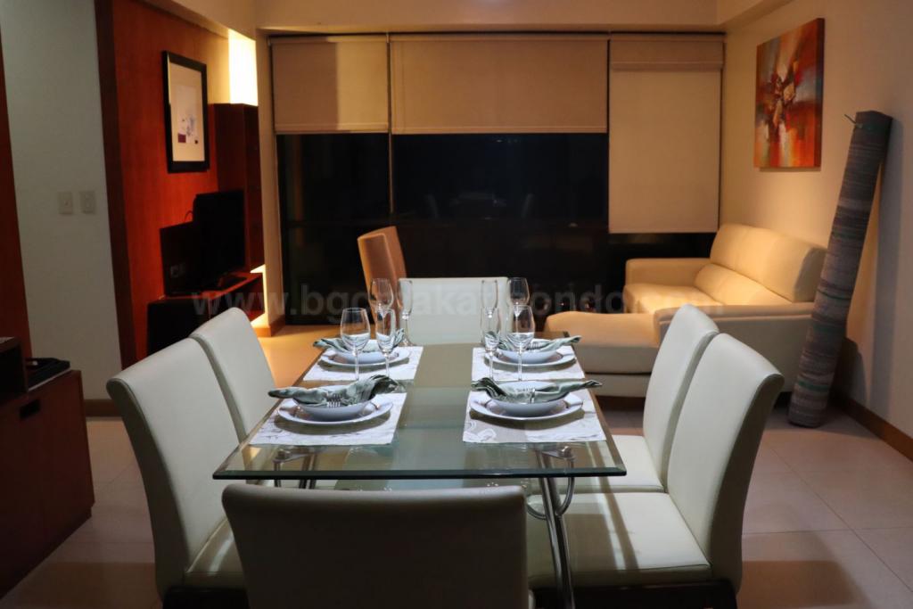 Dining and living areas of 2-bedroom condo unit at Bonifacio Ridge