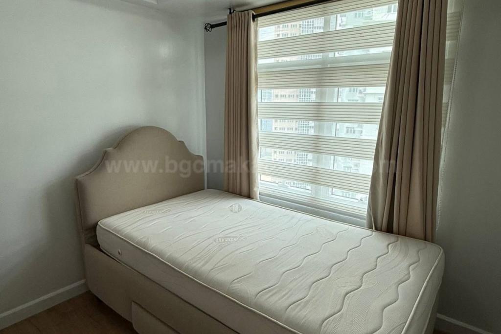 Bedroom 2 of 3-bedroom condo unit at Two Serendra The Red Oak Tower