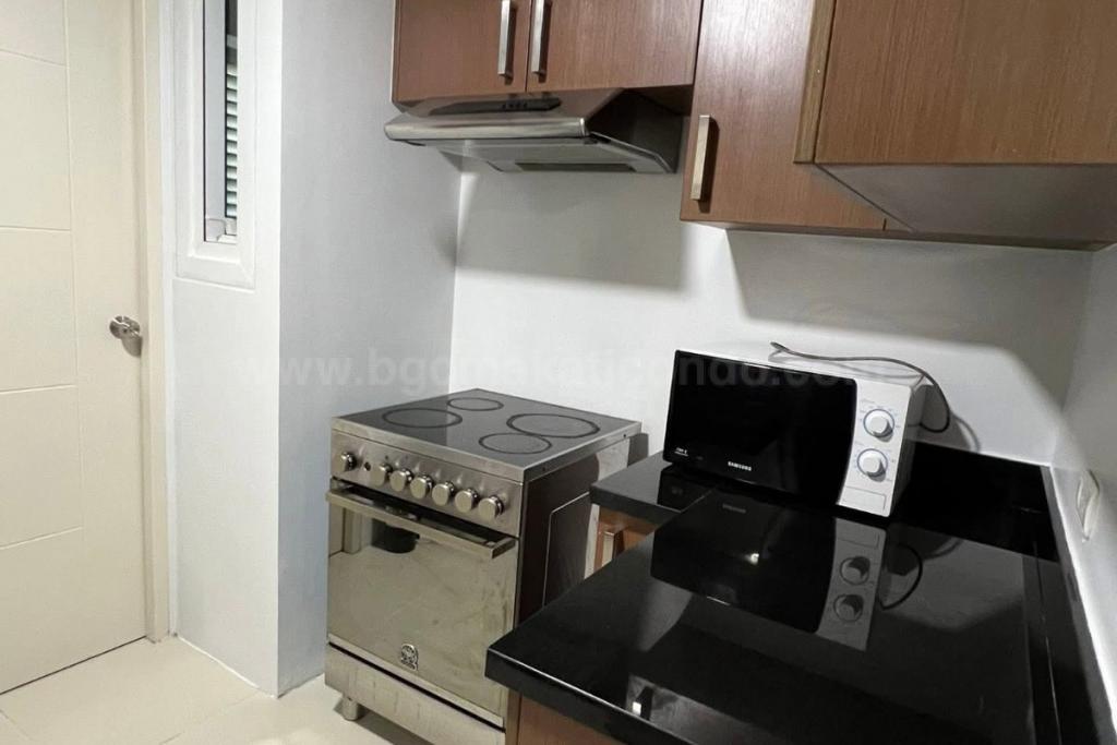 Kitchen area of 3-bedroom condo unit at Two Serendra The Red Oak Tower