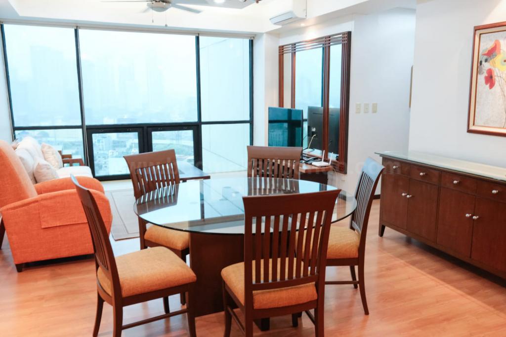 Dining and living areas of 2-bedroom condo unit at Bonifacio Ridge