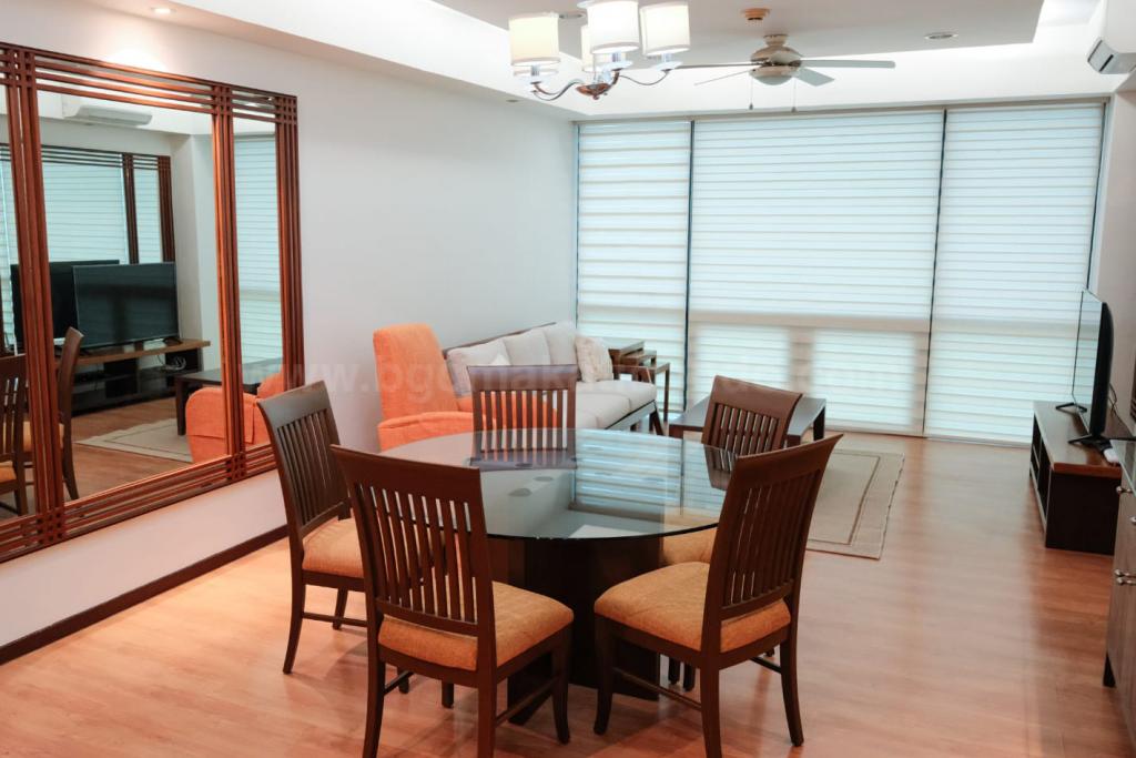 Dining and living areas of 2-bedroom condo unit at Bonifacio Ridge