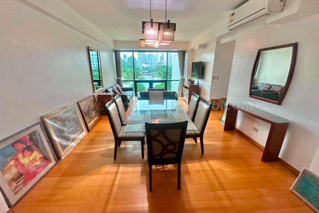 Dining and living areas of 2-bedroom condo unit at Bonifacio Ridge