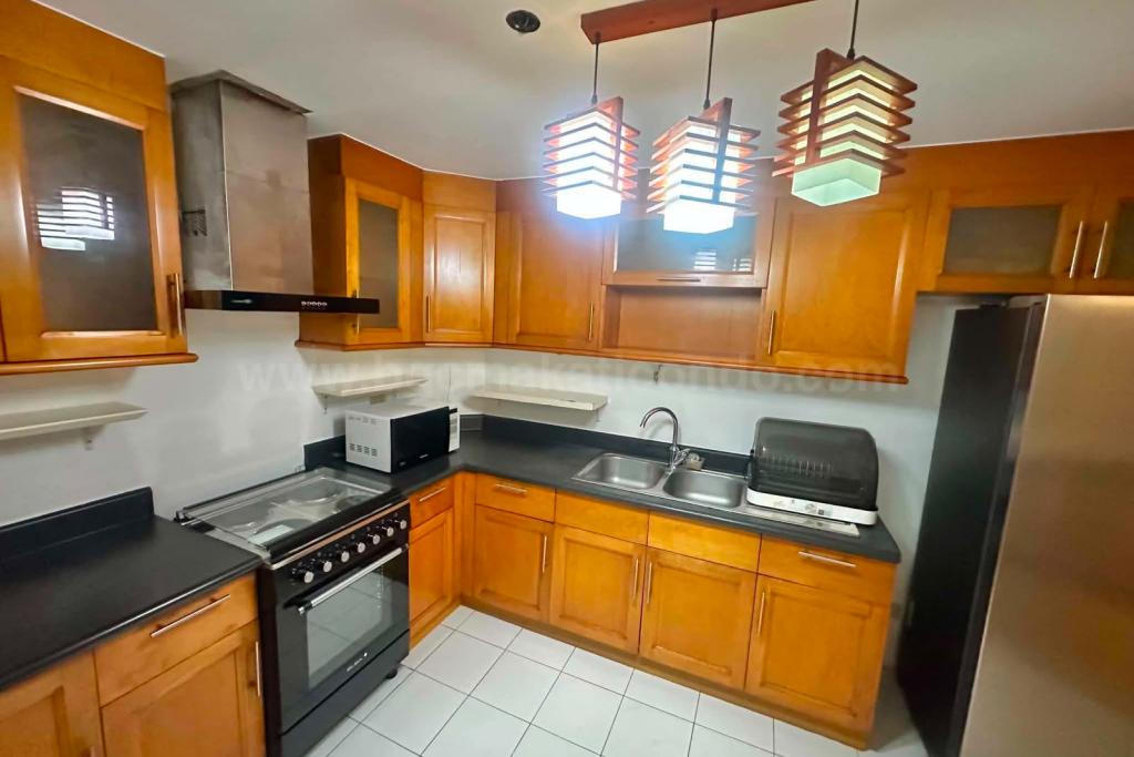 Kitchen area of 2-bedroom condo unit at Bonifacio Ridge