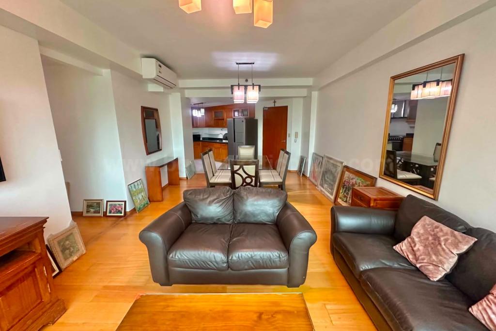 Living and dining areas of 2-bedroom condo unit at Bonifacio Ridge