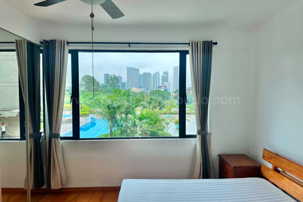 Master bedroom of 2-bedroom condo unit at Bonifacio Ridge