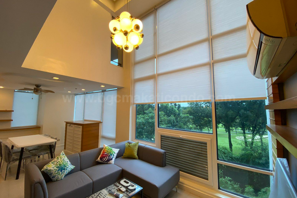 High ceiling living area of two bedroom condominium unit at Bellagio tower 2