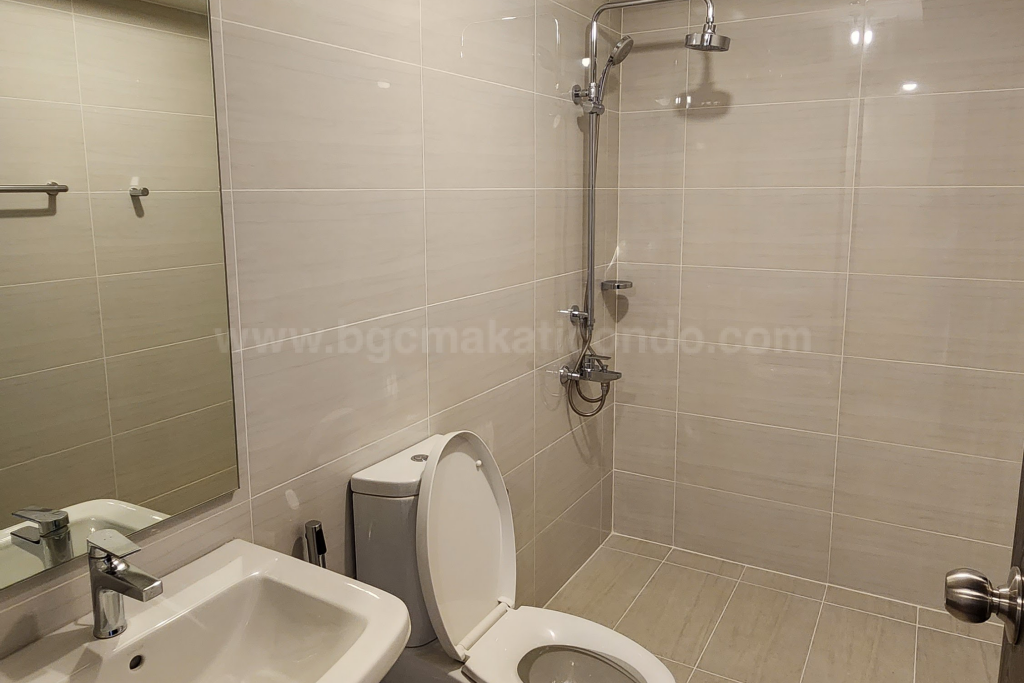 Common toilet and bath of 3-bedroom condominium unit at Park Triangle Residences