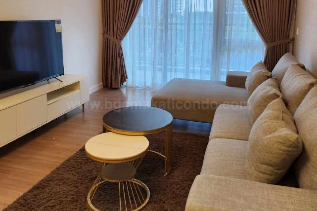 Living area showing television of 2-bedroom unit at Verve Residences