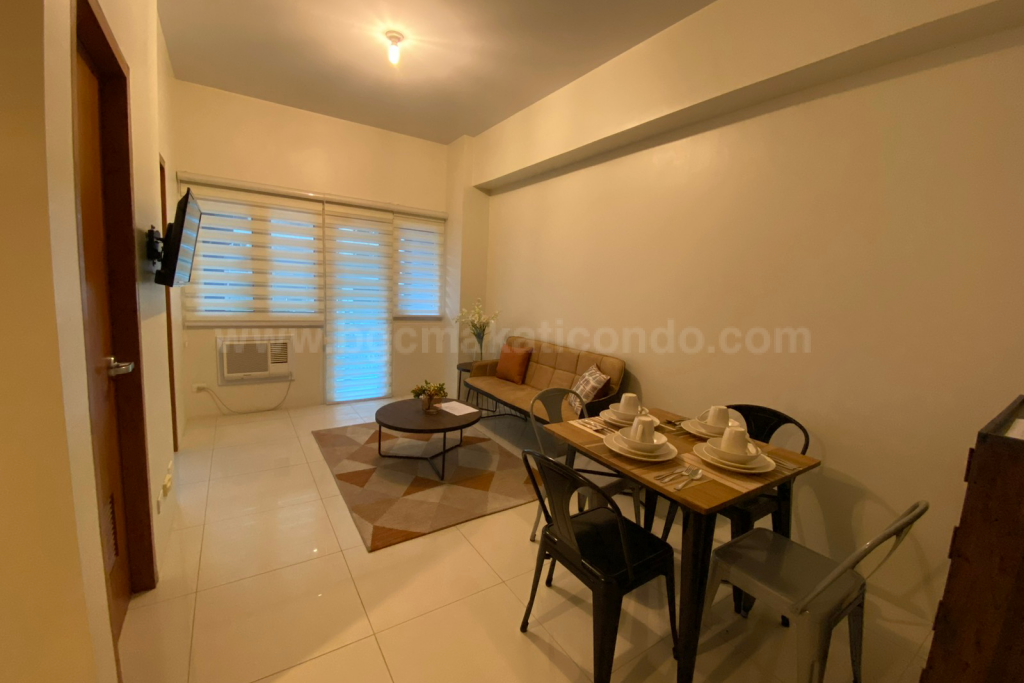 Dining and living areas of 1-bedroom condo unit at Central Park West