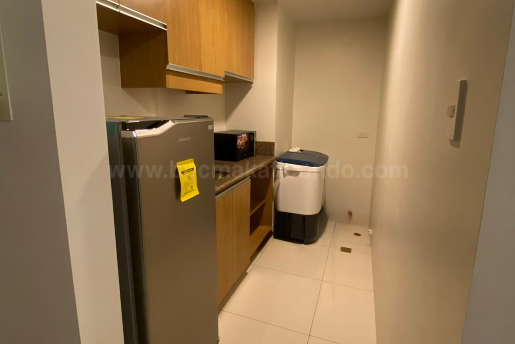Kitchen area of 1-bedroom condo unit at Central Park West