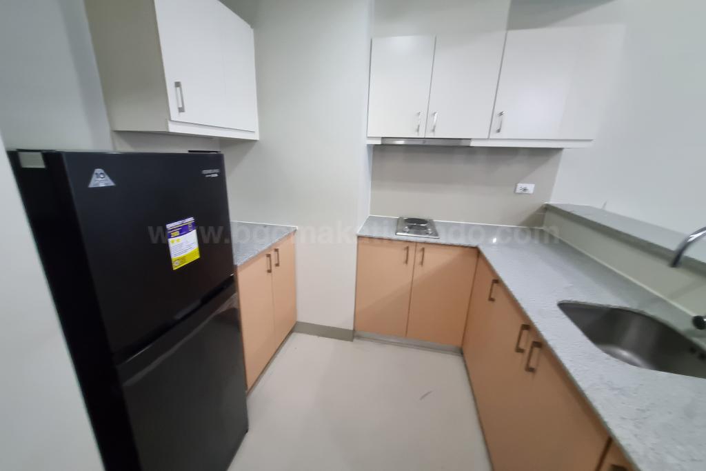 Kitchen area of 1-bedroom condo unit at Uptown Parksuites