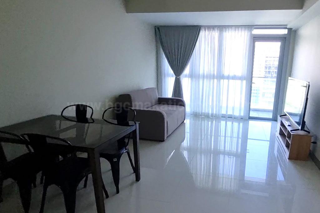 Living area of 1-bedroom condo unit at Uptown Parksuites
