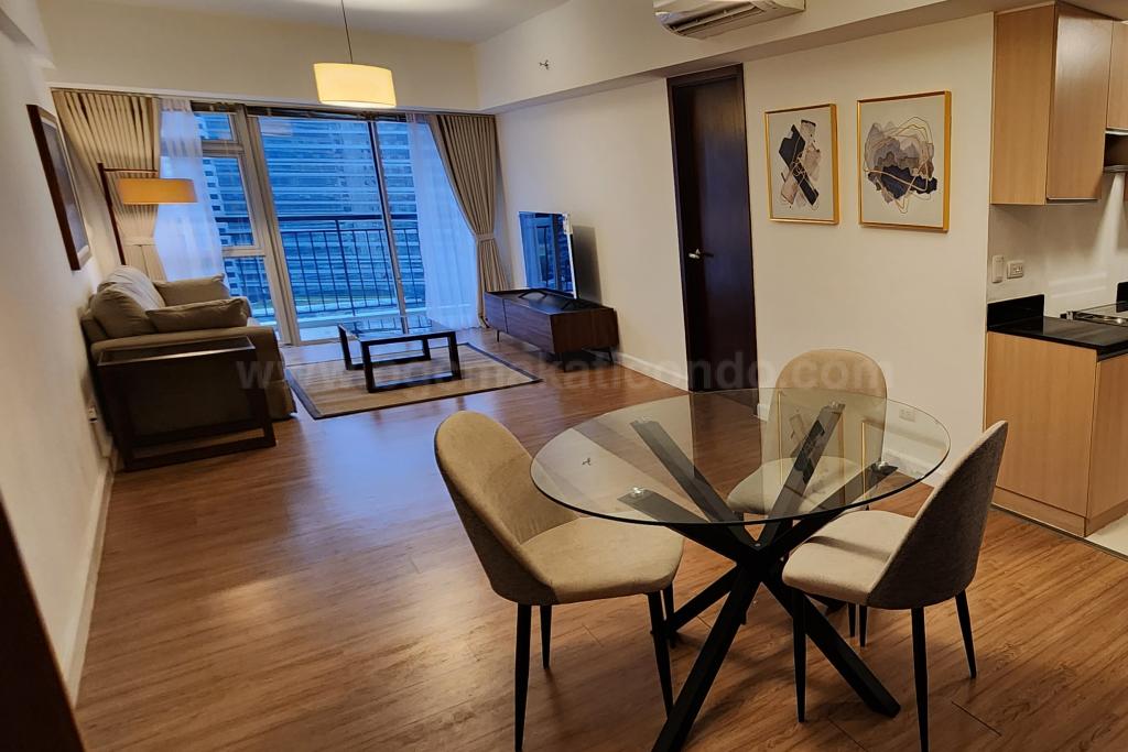 Dining and living areas of 1-bedroom condo unit at Verve Residences